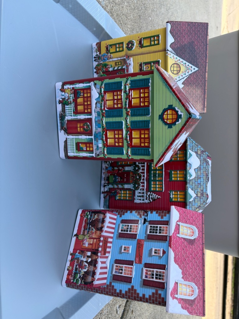 Set of 4 tin Vintage Harry London Fannie May Christmas Village Tin Set